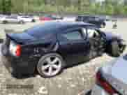 2009 Dodge Charger SRT-8 с VIN 2B3LA73W39H597691, выставлен на аукционе Copart как лот 55094195 с пробегом 156 283 миль миль и Списание • Salvage title. История ставок и продаж доступна на DreamBid. Изображение 3.