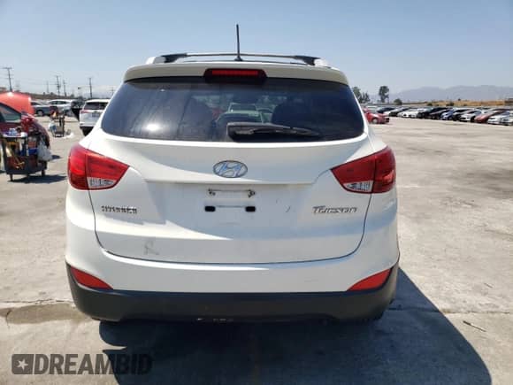 2012 Hyundai Tucson GLS z VIN KM8JU3AC2CU364867, wystawiony jako Copart lot #64456034 z przebiegiem 133 562 mil mil oraz Szkoda całkowita • Salvage title. Historia ofert i sprzedaży dostępna na DreamBid. Obrazek 6.