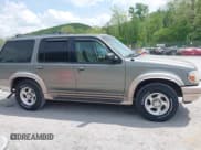 ✅ 2000 Ford Explorer Eddie Bauer • VIN: 1FMDU74E2YUA00568 • Lot: 42176409. Wystawiony na IAAI z przebiegiem 150 479 mil. Bezpłatny archiwum sprzedaży aukcyjnych z USA i szczegółowy raport historii pojazdu na DreamBid. Zdjęcie 13.
