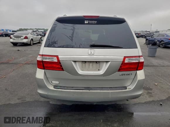 ✅ 2005 Honda Odyssey EX-L • VIN: 5FNRL38795B069506 • Lot: 95413305. Listed on Copart with 258,326 mi. Free auction sales archive from the USA and detailed vehicle history report at DreamBid. Image 6.