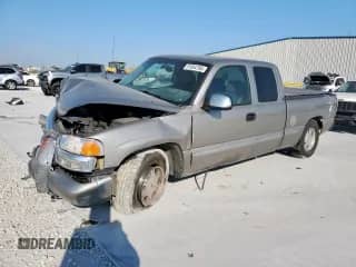 2001 GMC Sierra 1500 SLE with VIN 1GTEC19T01Z186989, listed as a Copart auction lot 81954785 with 199,617 mi miles and Salvage title. Bid and sale history available at DreamBid. Image 1.