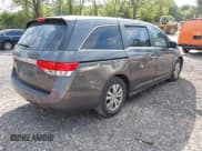 ✅ 2014 Honda Odyssey EX-L • VIN: 5FNRL5H60EB120877 • Lot: 42061130. Wystawiony na IAAI z przebiegiem 215 356 mil. Bezpłatny archiwum sprzedaży aukcyjnych z USA i szczegółowy raport historii pojazdu na DreamBid. Zdjęcie 4.