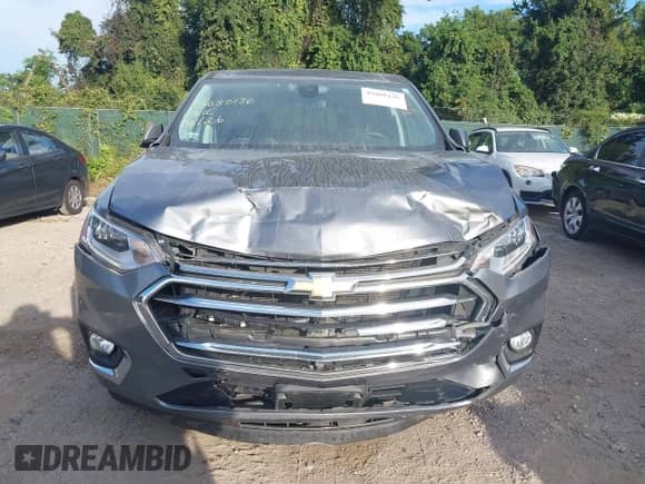 2020 Chevrolet Traverse High Country with VIN 1GNEVNKW4LJ154397, listed as a IAAI auction lot 43080136 with 68,754 mi miles and . Bid and sale history available at DreamBid. Image 6.