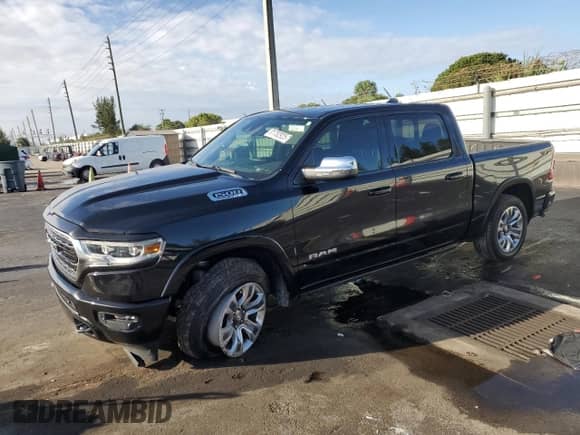 2023 Ram 1500 Limited with VIN 1C6SRFHT7PN533984, listed as a Copart auction lot 81782925 with 56,080 mi miles and Non repairable. Bid and sale history available at DreamBid. Image 1.