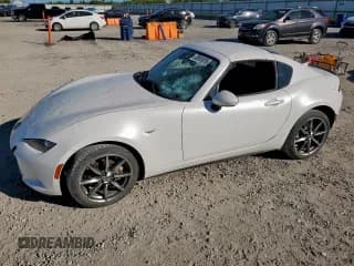✅ 2021 Mazda MX-5 Miata Grand Touring • VIN: JM1NDAM7XM0456827 • Lot: 92041875. Listed on Copart with 21,948 mi. Free auction sales archive from the USA and detailed vehicle history report at DreamBid. Image 1.