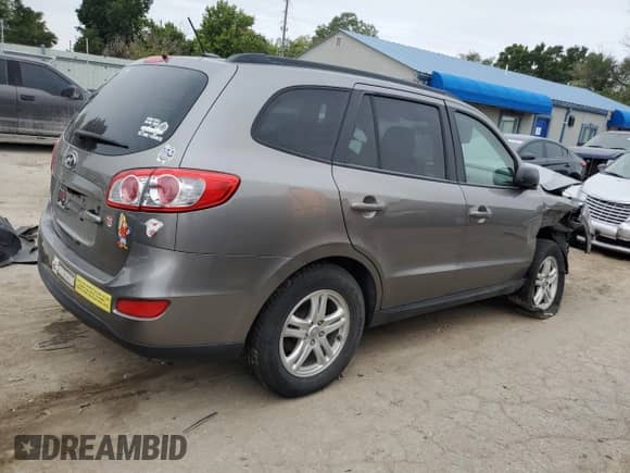 2012 Hyundai Santa Fe GLS z VIN 5XYZG3AB3CG123312, wystawiony jako Copart lot #70588935 z przebiegiem Nie podano mil oraz Szkoda całkowita • Salvage title. Historia ofert i sprzedaży dostępna na DreamBid. Obrazek 3.