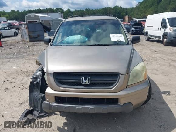 2004 Honda Pilot LX with VIN 2HKYF181X4H539819, listed as a IAAI auction lot 42947393 with 241,204 mi miles and . Bid and sale history available at DreamBid. Image 12.