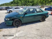 ✅ 1997 Subaru Impreza • VIN: JF1GM4255VH401478 • Lot: 56221515. Listed on Copart with 75,202 mi. Free auction sales archive from the USA and detailed vehicle history report at DreamBid. Image 1.