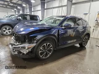 ✅ 2023 Mazda CX-5 S Premium • VIN: JM3KFBDM3P0101423 • Lot: 84703015. Wystawiony na Copart z przebiegiem 36 692 mil. Bezpłatny archiwum sprzedaży aukcyjnych z USA i szczegółowy raport historii pojazdu na DreamBid. Zdjęcie 1.