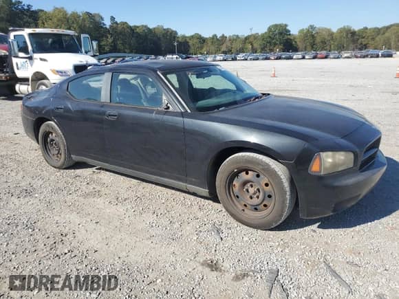 2007 Dodge Charger z VIN 2B3LA43R17H815228, wystawiony jako Copart lot #74640274 z przebiegiem 266 748 mil mil oraz Szkoda całkowita • Salvage title. Historia ofert i sprzedaży dostępna na DreamBid. Obrazek 4.