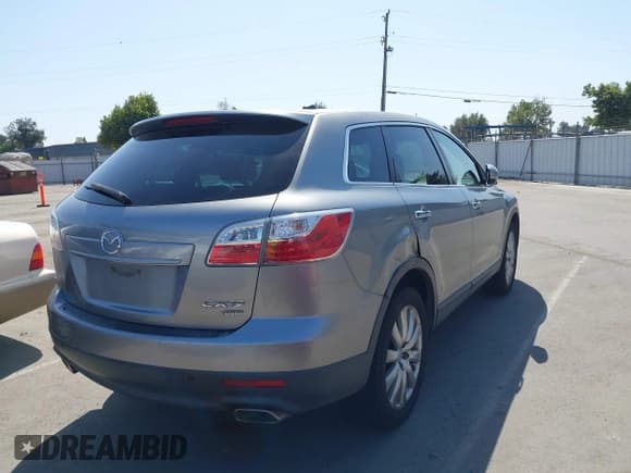 ✅ 2010 Mazda CX-9 Touring • VIN: JM3TB3MV8A0203144 • Lot: 42438812. Listed on IAAI with 197,667 mi. Free auction sales archive from the USA and detailed vehicle history report at DreamBid. Image 4.