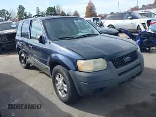 ✅ 2003 Ford Escape XLT Popular • VIN: 1FMYU03103KA70873 • Lot: 43625067. Listed on IAAI with 221,621 mi. Free auction sales archive from the USA and detailed vehicle history report at DreamBid. Image 1.