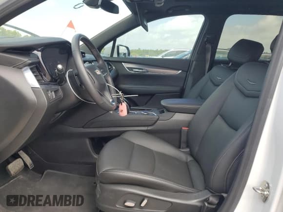 ✅ 2023 Cadillac XT6 FWD Luxury • VIN: 1GYKPAR4XPZ228457 • Lot: 51110765. Wystawiony na Copart z przebiegiem 22 439 mil. Bezpłatny archiwum sprzedaży aukcyjnych z USA i szczegółowy raport historii pojazdu na DreamBid. Zdjęcie 7.