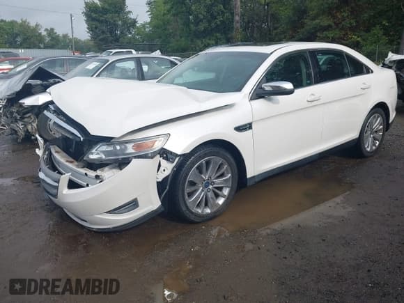 ✅ 2012 Ford Taurus Limited • VIN: 1FAHP2FW7CG133054 • Lot: 43287508. Listed on IAAI with 53,577 mi. Free auction sales archive from the USA and detailed vehicle history report at DreamBid. Image 2.