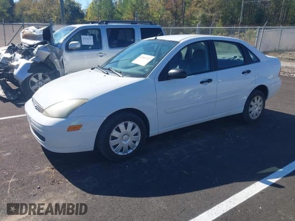 ✅ 2004 Ford Focus SE • VIN: 1FAFP34314W142443 • Лот: 43601717. Опубликован ранее на IAAI с пробегом 17 015 миль. Бесплатный доступ к архиву аукционных продаж из США и подробный отчёт об истории автомобиля на DreamBid. Изображение 2.