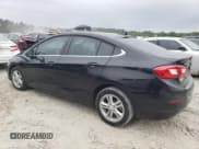 ✅ 2018 Chevrolet Cruze LT • VIN: 1G1BE5SM8J7242236 • Lot: 49886043. Listed on Copart with 65,872 mi. Free auction sales archive from the USA and detailed vehicle history report at DreamBid. Image 2.