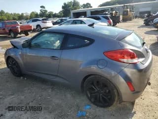 ✅ 2013 Hyundai Veloster w/Black Int • VIN: KMHTC6AD6DU172715 • Lot: 73066804. Wystawiony na Copart z przebiegiem 57 244 mil. Bezpłatny archiwum sprzedaży aukcyjnych z USA i szczegółowy raport historii pojazdu na DreamBid. Zdjęcie 2.