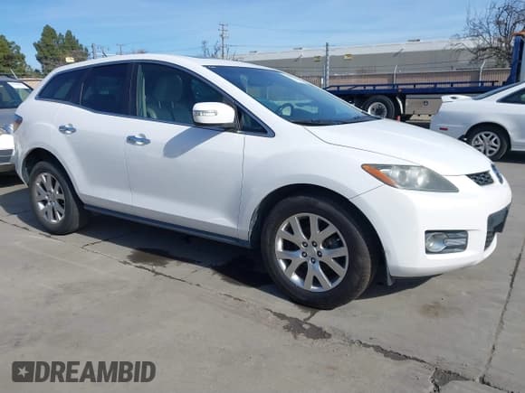 ✅ 2009 Mazda CX-7 Grand Touring • VIN: JM3ER29L390228163 • Лот: 41644725. Опубликован ранее на IAAI с пробегом 144 938 миль. Бесплатный доступ к архиву аукционных продаж из США и подробный отчёт об истории автомобиля на DreamBid. Изображение 1.
