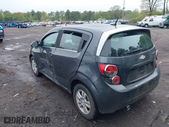 2013 Chevrolet Sonic LT with VIN 1G1JD6SB9D4106495, listed as a IAAI auction lot 42197074 with 155,204 mi miles and . Bid and sale history available at DreamBid. Image 3.