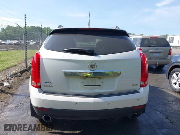 ✅ 2012 Cadillac SRX Performance Collection • VIN: 3GYFNBE30CS599466 • Lot: 42053911. Listed on IAAI with 167,242 mi. Free auction sales archive from the USA and detailed vehicle history report at DreamBid. Image 16.
