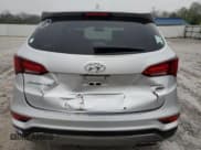 ✅ 2017 Hyundai Santa Fe 2.4L • VIN: 5XYZTDLB1HG443265 • Лот: 50356154. Опубликован ранее на Copart с пробегом 129 987 миль. Бесплатный доступ к архиву аукционных продаж из США и подробный отчёт об истории автомобиля на DreamBid. Изображение 6.