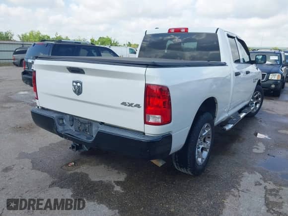 2015 Ram 1500 Express with VIN 1C6RR7FT3FS504568, listed as a IAAI auction lot 42410901 with 207,307 mi miles and . Bid and sale history available at DreamBid. Image 4.