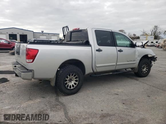 ✅ 2011 Nissan Titan SV • VIN: 1N6BA0EJ9BN310352 • Lot: 80104774. Wystawiony na Copart z przebiegiem 186 015 mil. Bezpłatny archiwum sprzedaży aukcyjnych z USA i szczegółowy raport historii pojazdu na DreamBid. Zdjęcie 3.