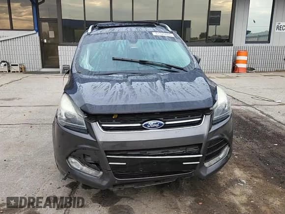 ✅ 2015 Ford Escape Titanium • VIN: 1FMCU9J9XFUA88037 • Lot: 81329605. Listed on Copart with 106,948 mi. Free auction sales archive from the USA and detailed vehicle history report at DreamBid. Image 14.