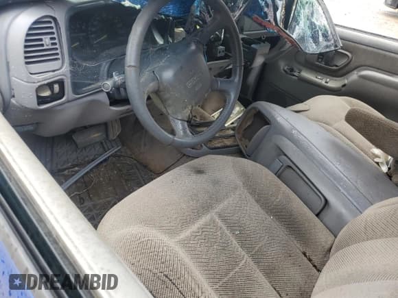 ✅ 1998 GMC Sierra 1500 • VIN: 1GTEK19R7WR506050 • Лот: 60539235. Опубликован ранее на Copart с пробегом Не указан. Бесплатный доступ к архиву аукционных продаж из США и подробный отчёт об истории автомобиля на DreamBid. Изображение 8.