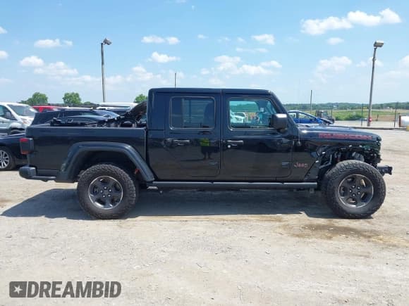 ✅ 2022 Jeep Gladiator Rubicon • VIN: 1C6JJTBM8NL169120 • Lot: 42573845. Listed on IAAI with 47,678 mi. Free auction sales archive from the USA and detailed vehicle history report at DreamBid. Image 13.