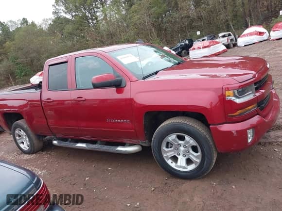 2018 Chevrolet Silverado 1500 LT z VIN 1GCVKREC6JZ176877, wystawiony jako IAAI lot #43559571 z przebiegiem Nie podano mil oraz . Historia ofert i sprzedaży dostępna na DreamBid. Obrazek 13.