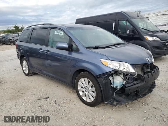 ✅ 2015 Toyota Sienna Limited • VIN: 5TDDK3DC9FS127157 • Lot: 82362895. Listed on Copart with 101,877 mi. Free auction sales archive from the USA and detailed vehicle history report at DreamBid. Image 4.