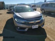 ✅ 2018 Honda Civic Touring • VIN: 19XFC1F95JE001392 • Lot: 87070235. Listed on Copart with 80,915 mi. Free auction sales archive from the USA and detailed vehicle history report at DreamBid. Image 13.