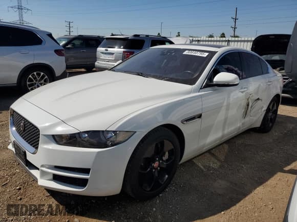 ✅ 2018 Jaguar XE 25t • VIN: SAJAS4FX5JCP19501 • Лот: 80640795. Опубликован ранее на Copart с пробегом 66 085 миль. Бесплатный доступ к архиву аукционных продаж из США и подробный отчёт об истории автомобиля на DreamBid. Изображение 1.