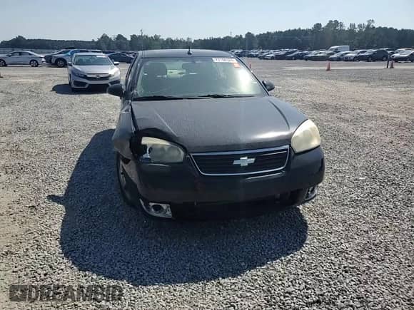 2007 Chevrolet Malibu LTZ z VIN 1G1ZU57N87F241072, wystawiony jako Copart lot #73156324 z przebiegiem 108 611 mil mil oraz Szkoda całkowita • Salvage title. Historia ofert i sprzedaży dostępna na DreamBid. Obrazek 11.
