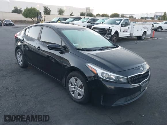 ✅ 2018 Kia Forte LX • VIN: 3KPFK4A79JE184676 • Лот: 43469459. Опубликован ранее на IAAI с пробегом 169 407 миль. Бесплатный доступ к архиву аукционных продаж из США и подробный отчёт об истории автомобиля на DreamBid. Изображение 1.