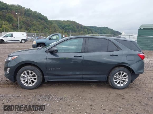 ✅ 2020 Chevrolet Equinox LS • VIN: 3GNAXHEV5LS567859 • Lot: 43386948. Listed on IAAI with 73,602 mi. Free auction sales archive from the USA and detailed vehicle history report at DreamBid. Image 14.