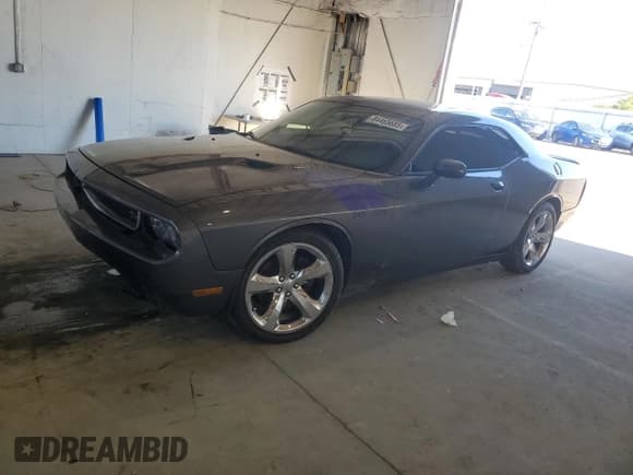 ✅ 2014 Dodge Challenger R/T Plus • VIN: 2C3CDYBT9EH302210 • Лот: 84465685. Опубликован ранее на Copart с пробегом 72 626 миль. Бесплатный доступ к архиву аукционных продаж из США и подробный отчёт об истории автомобиля на DreamBid. Изображение 1.