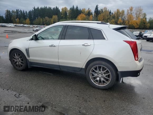 ✅ 2013 Cadillac SRX Premium Collection • VIN: 3GYFNJE37DS642647 • Лот: 91599445. Опубликован ранее на Copart с пробегом 146 632 миль. Бесплатный доступ к архиву аукционных продаж из США и подробный отчёт об истории автомобиля на DreamBid. Изображение 2.