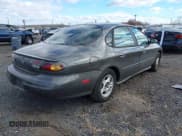 ✅ 1996 Ford Taurus GL • VIN: 1FALP52U9TA199317 • Lot: 43694961. Wystawiony na IAAI z przebiegiem 99 130 mil. Bezpłatny archiwum sprzedaży aukcyjnych z USA i szczegółowy raport historii pojazdu na DreamBid. Zdjęcie 4.