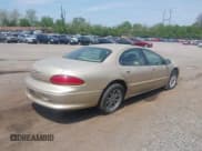 ✅ 1999 Chrysler LHS • VIN: 2C3HC56G2XH259238 • Lot: 40889553. Listed on IAAI with 194,709 mi. Free auction sales archive from the USA and detailed vehicle history report at DreamBid. Image 4.