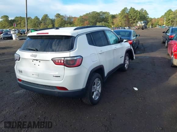 2022 Jeep Compass Latitude with VIN 3C4NJDBB6NT230743, listed as a IAAI auction lot 43381627 with 13,773 mi miles and . Bid and sale history available at DreamBid. Image 4.