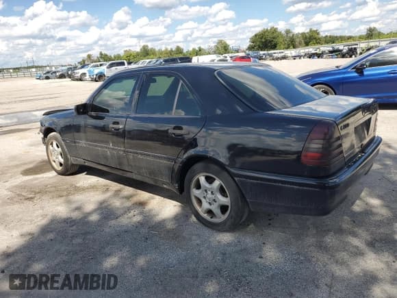 ✅ 1999 Mercedes-Benz C 230/260/280/320 • VIN: WDBHA29G7XA799919 • Lot: 82103355. Listed on Copart with 122,966 mi. Free auction sales archive from the USA and detailed vehicle history report at DreamBid. Image 2.