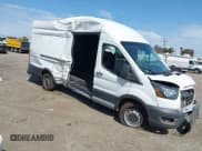 ✅ 2021 Ford Transit Cargo • VIN: 1FTBR3X85MKA03949 • Lot: 43112009. Listed on IAAI with 113,531 mi. Free auction sales archive from the USA and detailed vehicle history report at DreamBid. Image 1.