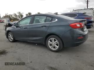 ✅ 2018 Chevrolet Cruze LT • VIN: 1G1BE5SM6J7107630 • Lot: 86537835. Listed on Copart with 118,854 mi. Free auction sales archive from the USA and detailed vehicle history report at DreamBid. Image 2.