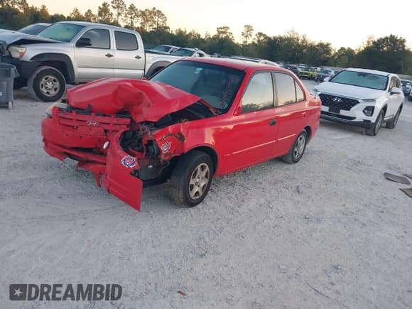 ✅ 2005 Hyundai Accent GLS • VIN: KMHCG45C25U592709 • Лот: 43434084. Опубликован ранее на IAAI с пробегом 122 038 миль. Бесплатный доступ к архиву аукционных продаж из США и подробный отчёт об истории автомобиля на DreamBid. Изображение 2.