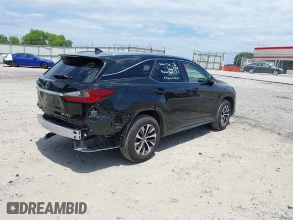 ✅ 2021 Lexus RX 350L • VIN: JTJHZKFA8M2034019 • Lot: 42243974. Listed on IAAI with 61,935 mi. Free auction sales archive from the USA and detailed vehicle history report at DreamBid. Image 4.