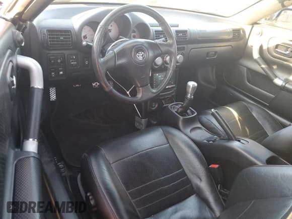 ✅ 2003 Toyota MR2 • VIN: JTDFR320330065914 • Лот: 88791655. Опубликован ранее на Copart с пробегом 125 564 миль. Бесплатный доступ к архиву аукционных продаж из США и подробный отчёт об истории автомобиля на DreamBid. Изображение 8.