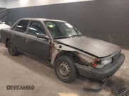 ✅ 1990 Toyota Camry • VIN: 4T1VV22E7LU030830 • Lot: 41971964. Wystawiony na IAAI z przebiegiem 164 488 mil. Bezpłatny archiwum sprzedaży aukcyjnych z USA i szczegółowy raport historii pojazdu na DreamBid. Zdjęcie 1.