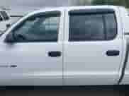 ✅ 2000 Dodge Dakota Sport • VIN: 1B7GL2AN4YS691223 • Лот: 41964561. Размещён на IAAI с пробегом 169 936 миль миль. Получите бесплатный доступ к архиву аукционных продаж из США и посмотрите подробный отчёт об истории автомобиля на DreamBid. Изображение 14.